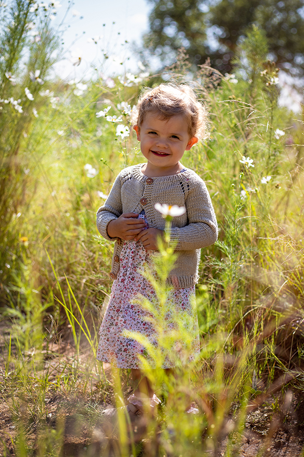 girl smiling in flowers